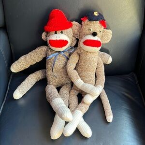 Red and Brown Sock Monkey Dolls with Accessories